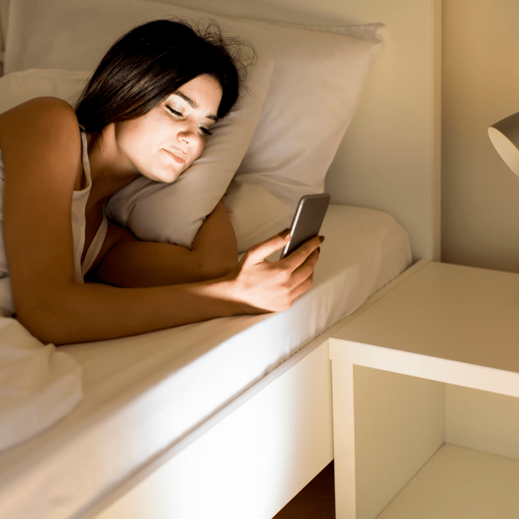 phone in bed, holistic health collective